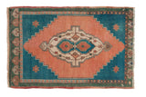 Distressed hand-knotted Oushak rug mat features apricot peach oblong medallion, deep turquoise field, 1'9