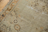 Distressed Oushak runner pile detail: worn antique ivory field, pale orange and brown vines.