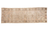 Distressed Oushak runner with faded floral medallions in beige, sand, brown, 3' x 8'9