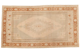 Vintage Distressed Oushak carpet featuring an elongated geometric medallion in beige, sand, terra cotta rust, 5x9.