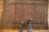 Vintage Kurdish Hamadan rug with blush, blue, and camel multi-column floral motif, showing visible wear.