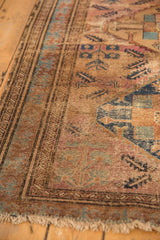 Reciprocating pawn motif, visible wear, and tattered fringe on vintage Malayer rug border.
