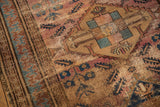 Malayer rug's large reciprocating pawn border detail, showing wear and sky blue, raspberry tones.