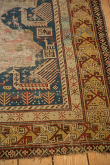Akstafa bird motifs within the indigo field and geometric borders on an antique Shirvan rug.