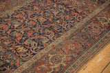 Antique Kurdish Bijar runner, interconnected floral pattern in navy and madder red, mostly even wear.