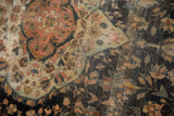 Antique Farahan Sarouk rug with scalloped medallion, floral field, and visible low pile.