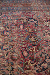 Vintage Meshed carpet featuring ornate scrolling floral motifs and botehs with even wear.