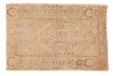 Vintage distressed Oushak rug, hand-knotted, oversized medallion, beige and soft pink.
