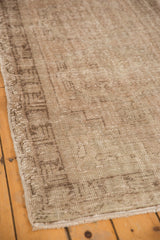 Distressed Oushak runner detail: worn pile revealing foundation, with original side selvage.