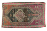 Distressed vintage Turkish Oushak rug with serrated medallion, pink, raspberry, and charcoal tones, 2'8