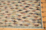 Playful, distressed Oushak runner with lattice diamond patterns in muted colors and visible pile wear.