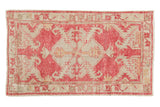 Distressed Oushak rug with raspberry red field, ivory diamond medallion, serrated leaves, and lustrous wool, 2'9