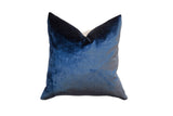Plush velvet throw pillow in rich cobalt blue, 18x18 inches.