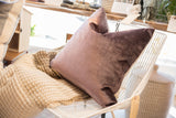 Luxe Velvet Throw Pillow showing plush texture, brass zipper, and linen backing.
