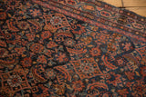 Hamadan runner: Herati motif, Serbend border, navy, red, orange, green hues, showing pile wear.