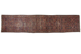 Vintage Hamadan rug runner, traditional Herati design in navy, red, and sand tones, showing historic wear, 3'8