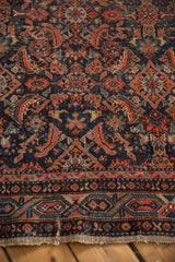 Hamadan runner's Herati pattern, Serbend border, navy, red, and visible foundation.
