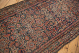 Hand-knotted Persian Hamadan runner, Herati motif, Serbend border, navy, red, beige, visible foundation.
