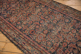 Vintage Hamadan runner: intricate Herati motif, Serbend border, visible foundation.