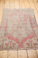 Intact side cord selvage and even wear on the blush distressed Oushak rug.