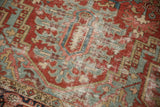 Antique Heriz carpet field detail, with faded cherry, teal geometric vinery and worn foundation.