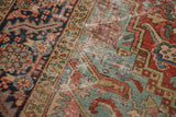 Aged Heriz carpet pile with rectilinear vinery in cherry red, powder blue, navy.