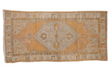 Vintage distressed Oushak runner, dusty tangerine orange field, ivory geometric medallion, 2'7