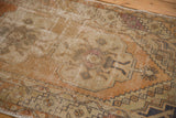 Oushak rug showing distressed texture, mostly even wear to foundation and knot heads.