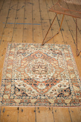 Antique Haji Jalili Tabriz rug styled to showcase its traditional design and scale.