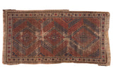Antique Caucasian rug, geometric triple medallions, madder red, navy, ivory, with age-related wear, 3' x 5'7