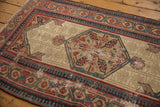 Antique Serab rug border detail: wide meandering vine, pawn motifs, with mostly even wear.
