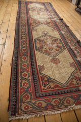 Antique Serab runner's fringe and intricate border with madder red pawn motifs.