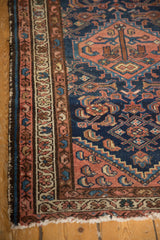 Exposed selvage and blush border details with Herati motif on vintage Borchalou rug.
