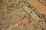 Antique Caucasian rug edge, tribal geometric border, muted field motifs, even wear with faint foundation.