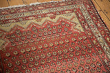 Antique Hamadan rug corner detail, unique saffron Mehrab overlay, boteh pattern, and even wear.