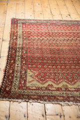 Collector's antique Hamadan rug with unique Mehrab end overlay and fringe.