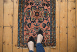 Vintage Persian Lilihan rug mat featuring a blush field, vine borders, and plush pile underfoot.