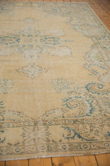 Distressed Oushak rug border, mallard green and coffee brown European stylized patterns.