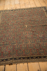 Antique Afshar rug displaying allover aubergine field, precise boteh patterns, and aged texture.