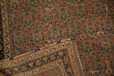 Folded antique Afshar rug corner, revealing hand-knotted foundation, colorful bound side, and aubergine boteh.