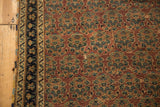 Fine antique Afshar rug displaying aubergine field, alternating teal botehs, and geometric navy border.