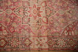 Vintage Farahan Sarouk rug border with charcoal, wine red, and pale bronze motifs.