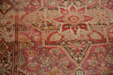 Fuchsia, wine red, and tangerine floral vinery with coffee bronze tones and clear abrashes.