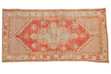 Hand-knotted Vintage Distressed Oushak runner, faded red and beige floral medallion, 2'7