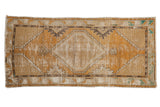 Vintage distressed Oushak runner with a diamond medallion, dusty gold, ivory, 2'7