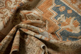 Textural detail showing low pile and time-softened sky blue, bronze tones of Oushak rug.