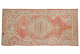 Distressed Oushak runner with diamond medallion, blush, beige, slate. 2'5