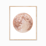 Katelyn Morse Warm Moon watercolor art print in a light wood frame.