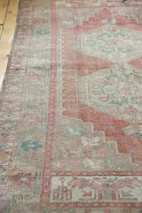 Distressed Oushak rug runner, low pile featuring faded blush, beige, and seafoam geometric motifs.