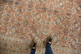 Distressed vintage Sivas carpet, allover floral motifs in terra cotta, ivory, and aqua.